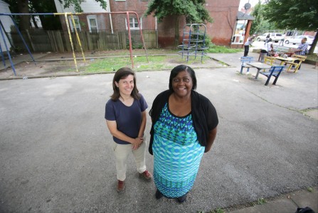 Pastor Lottie Lee-Davis of Be Ready Jesus Is Coming Church, right, and Christian Willauer, stand in the fourth street park in Wilmington, Saturday, July 18, 2015. (Photo by Tim Hawk)