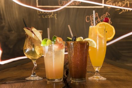 Creative brunch cocktails at Grain include the Bloody Mary made with beef jerky and a manmosa, called Shavasana, that's made with Dogfish Head's Namaste. (Photo by Joe del Tufo)