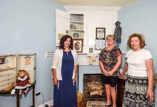 Esther Lovlie, Sani Sarver and Jean Norvell in front of the fireplace where William Penn spent his first night in New Castle.